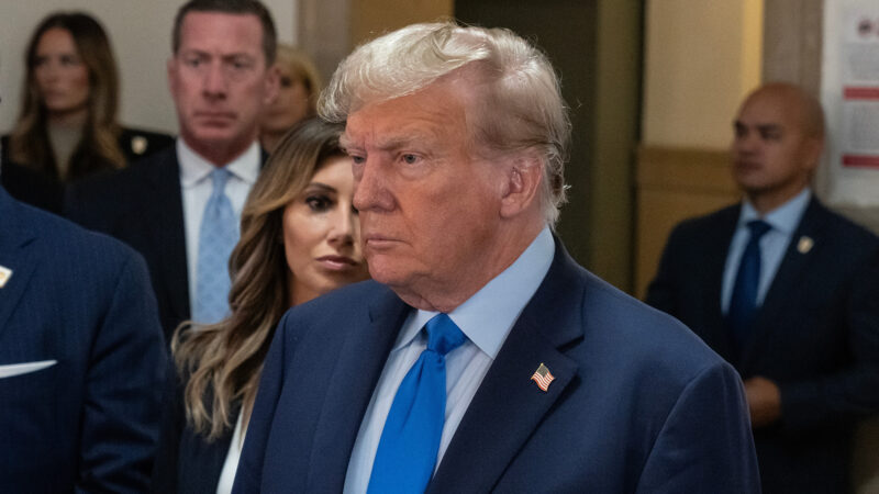 Donald Trump addressing reporters.